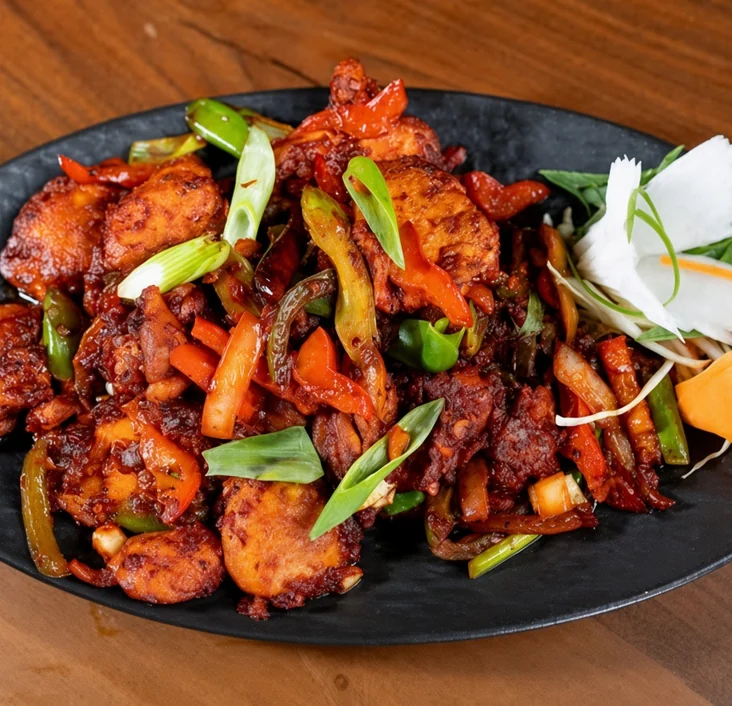 Szechuan chicken, an Indo-Chinese Hakka dish at de Delhi Indian & Hakka Kitchen, Mississauga